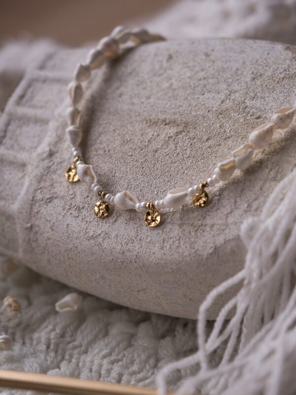 collier de plage en coquillage